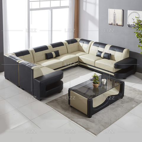 Divano in vera pelle color crema a forma di U
