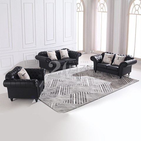 Divano da salotto classico in pelle nera Chesterfield